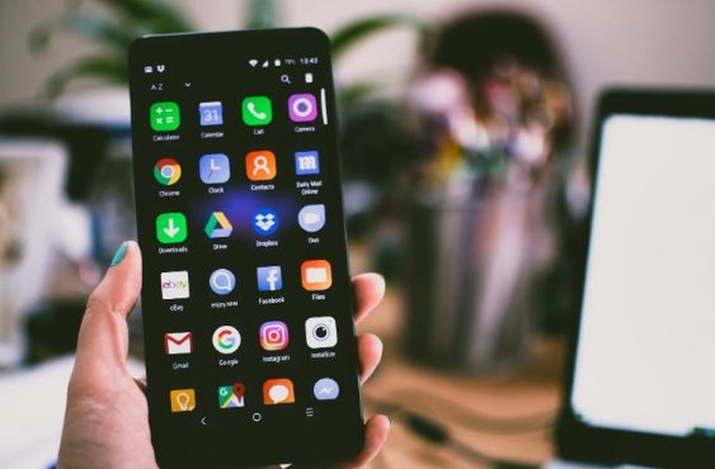 Android smartphone displaying AI app icons on the home screen