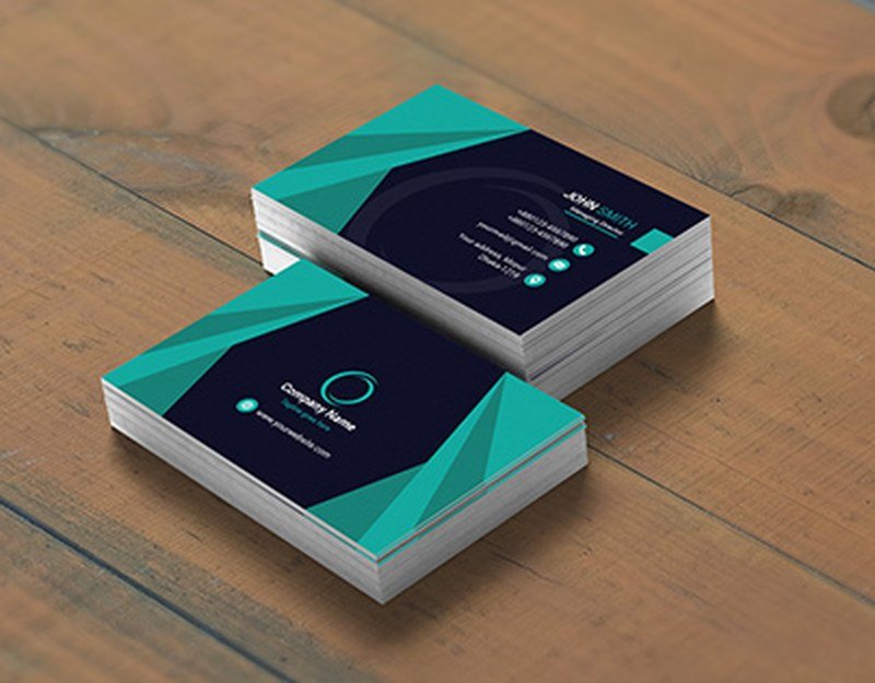 Business cards and branding design mockups on a table