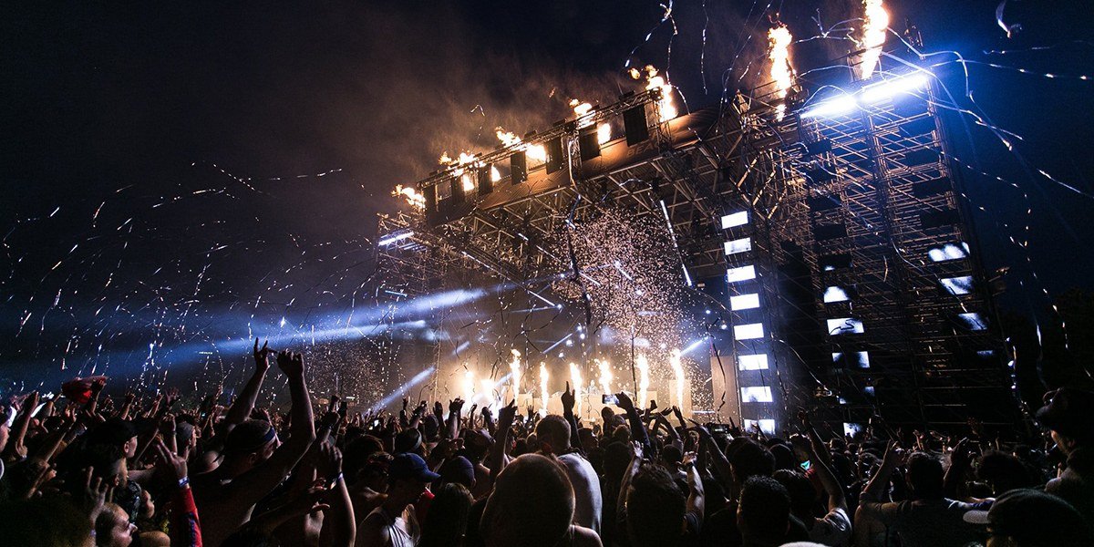 Concert stage with lights and crowd for live music