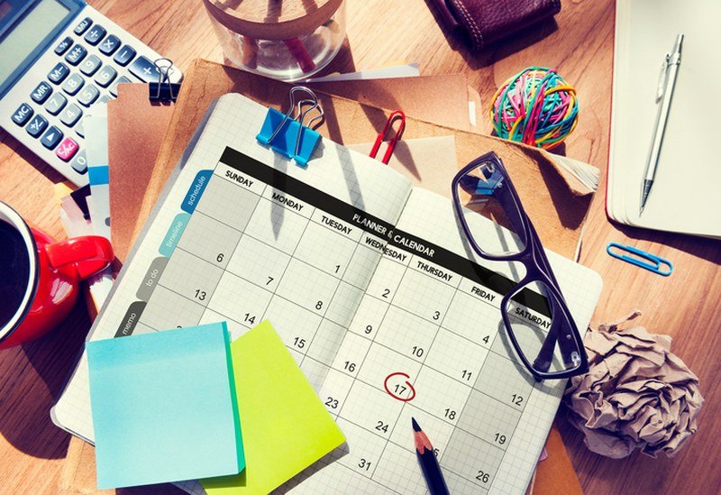 Calendar and schedule planning with AI automation on a desk