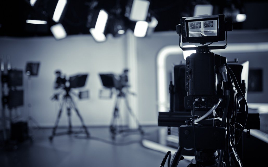 Video production set with camera and studio lights